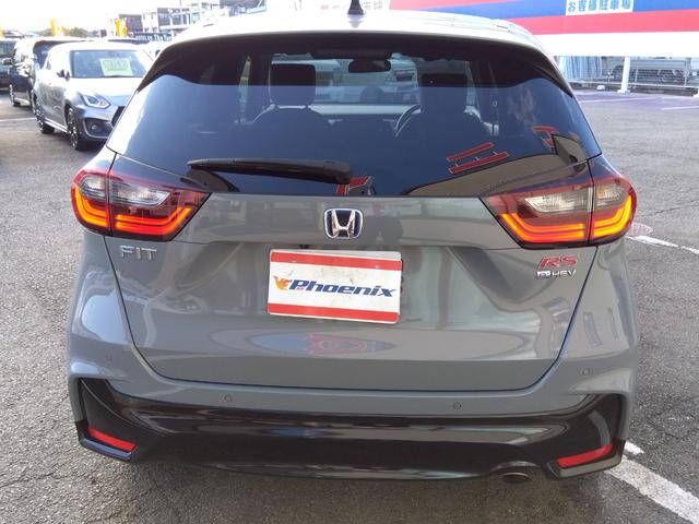 フィット ｅ：ＨＥＶ　ＲＳ★純正９インチナビフルセグＴＶ★ホンダセンシ　ング★ＬＥＤオートライト★パドルシフト★ＳＯＳコール★革巻ステアリング★４輪ディスクブレーキ★ＲＳ専用エクステリア★アームレストコンソール★レーダークルーズコントロール★ビルトインＥＴＣ２．０★（9枚目）