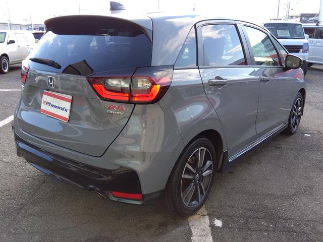 フィット ｅ：ＨＥＶ　ＲＳ★純正９インチナビフルセグＴＶ★ホンダセンシ　ング★ＬＥＤオートライト★パドルシフト★ＳＯＳコール★革巻ステアリング★４輪ディスクブレーキ★ＲＳ専用エクステリア★アームレストコンソール★レーダークルーズコントロール★ビルトインＥＴＣ２．０★（10枚目）