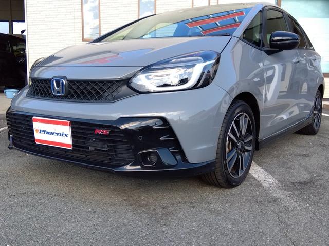 フィット ｅ：ＨＥＶ　ＲＳ★純正９インチナビフルセグＴＶ★ホンダセンシ　ング★ＬＥＤオートライト★パドルシフト★ＳＯＳコール★革巻ステアリング★４輪ディスクブレーキ★ＲＳ専用エクステリア★アームレストコンソール★レーダークルーズコントロール★ビルトインＥＴＣ２．０★（12枚目）