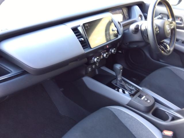 フィット ｅ：ＨＥＶ　ＲＳ★純正９インチナビフルセグＴＶ★ホンダセンシ　ング★ＬＥＤオートライト★パドルシフト★ＳＯＳコール★革巻ステアリング★４輪ディスクブレーキ★ＲＳ専用エクステリア★アームレストコンソール★レーダークルーズコントロール★ビルトインＥＴＣ２．０★（29枚目）