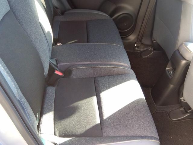 フィット ｅ：ＨＥＶ　ＲＳ★純正９インチナビフルセグＴＶ★ホンダセンシ　ング★ＬＥＤオートライト★パドルシフト★ＳＯＳコール★革巻ステアリング★４輪ディスクブレーキ★ＲＳ専用エクステリア★アームレストコンソール★レーダークルーズコントロール★ビルトインＥＴＣ２．０★（55枚目）