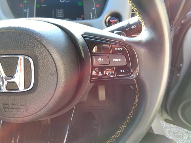 フィット ｅ：ＨＥＶ　ＲＳ★純正９インチナビフルセグＴＶ★ホンダセンシ　ング★ＬＥＤオートライト★パドルシフト★ＳＯＳコール★革巻ステアリング★４輪ディスクブレーキ★ＲＳ専用エクステリア★アームレストコンソール★レーダークルーズコントロール★ビルトインＥＴＣ２．０★（66枚目）