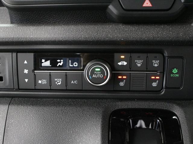 Ｎ－ＢＯＸカスタム ベースグレード　届出済未使用車　電動スライド　電子パーキング　渋滞追従クルコン　衝突軽減　誤発進抑制　革ハンドル　ハーフレザー　前席シートヒーター　シートバックテーブル　ロールサンシェード　パドルシフト　純正１４ＡＷ（9枚目）