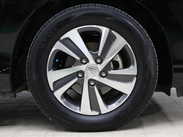 フリード Ｇ・ホンダセンシング　純正ナビ　両側パワスラ　ハーフレザー　本革巻きステアリング　ＬＥＤアクティブコーナリングライト　純正１５インチＡＷ　オートリトラミラー　シートヒーター　スマートキー　シートヒータ　禁煙車　ワンオーナー（17枚目）