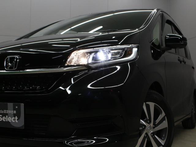 フリード Ｇ・ホンダセンシング　純正ナビ　両側パワスラ　ハーフレザー　本革巻きステアリング　ＬＥＤアクティブコーナリングライト　純正１５インチＡＷ　オートリトラミラー　シートヒーター　スマートキー　シートヒータ　禁煙車　ワンオーナー（18枚目）