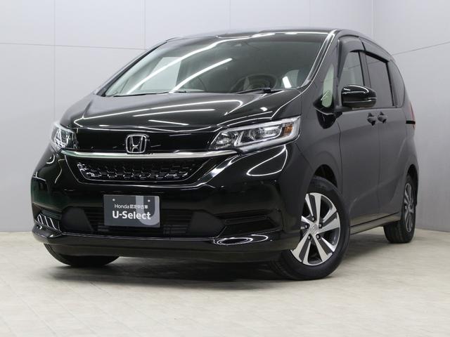 フリード Ｇ・ホンダセンシング　純正ナビ　両側パワスラ　ハーフレザー　本革巻きステアリング　ＬＥＤアクティブコーナリングライト　純正１５インチＡＷ　オートリトラミラー　シートヒーター　スマートキー　シートヒータ　禁煙車　ワンオーナー（22枚目）