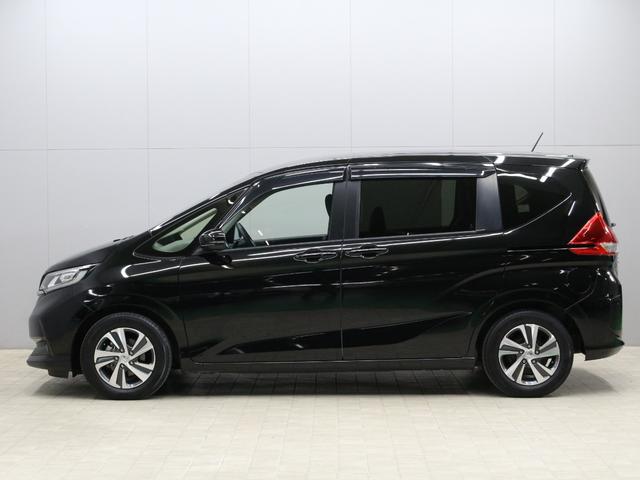 フリード Ｇ・ホンダセンシング　純正ナビ　両側パワスラ　ハーフレザー　本革巻きステアリング　ＬＥＤアクティブコーナリングライト　純正１５インチＡＷ　オートリトラミラー　シートヒーター　スマートキー　シートヒータ　禁煙車　ワンオーナー（26枚目）