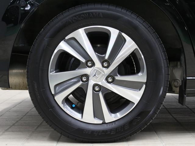 フリード Ｇ・ホンダセンシング　純正ナビ　両側パワスラ　ハーフレザー　本革巻きステアリング　ＬＥＤアクティブコーナリングライト　純正１５インチＡＷ　オートリトラミラー　シートヒーター　スマートキー　シートヒータ　禁煙車　ワンオーナー（30枚目）