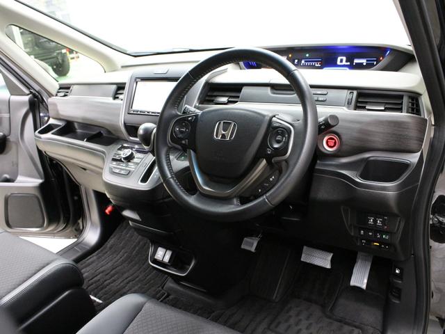 フリード Ｇ・ホンダセンシング　純正ナビ　両側パワスラ　ハーフレザー　本革巻きステアリング　ＬＥＤアクティブコーナリングライト　純正１５インチＡＷ　オートリトラミラー　シートヒーター　スマートキー　シートヒータ　禁煙車　ワンオーナー（33枚目）