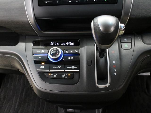 フリード Ｇ・ホンダセンシング　純正ナビ　両側パワスラ　ハーフレザー　本革巻きステアリング　ＬＥＤアクティブコーナリングライト　純正１５インチＡＷ　オートリトラミラー　シートヒーター　スマートキー　シートヒータ　禁煙車　ワンオーナー（46枚目）