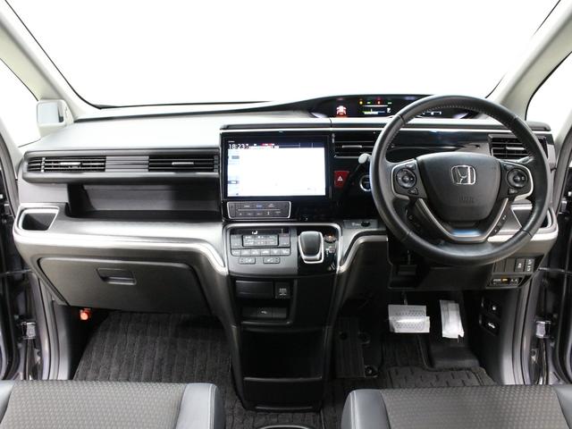 ステップワゴンスパーダ e:HEVスパーダG・EXホンダセンシング 純正10型メモリーナビ 純正11.6型後席モニター わくわくゲート 両側パワスラ 衝突軽減 誤発進抑制 渋滞追従機能付クルコン バックカメラ 純正16インチAW LEDヘッド 禁煙車 ワンオーナー(5枚目)