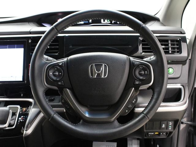 ステップワゴンスパーダ e:HEVスパーダG・EXホンダセンシング 純正10型メモリーナビ 純正11.6型後席モニター わくわくゲート 両側パワスラ 衝突軽減 誤発進抑制 渋滞追従機能付クルコン バックカメラ 純正16インチAW LEDヘッド 禁煙車 ワンオーナー(12枚目)