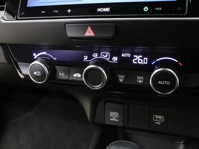 フィット ｅ：ＨＥＶホーム　８型ディスプレイオーディオ　ドラレコ前後　ＬＥＤヘッド　ハーフレザーシート　電子パーキング　衝突軽減　誤発進抑制　レーダークルーズ　本革ステアリング　サイドカーテンエアバック　禁煙車　ワンオーナー（47枚目）