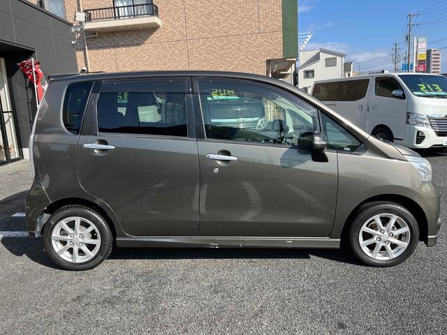 ムーヴ カスタム　Ｘリミテッド　純正メモリーナビ　ワンセグＴＶ　ＣＤ　ＡＭ／ＦＭ　バックカメラ　オートＡＣ　純正１４ＡＷ　ウインカーミラー　ＨＩＤライト　フォグライト　ベンチシート　オートライト　センターメーター　プッシュスタート（5枚目）