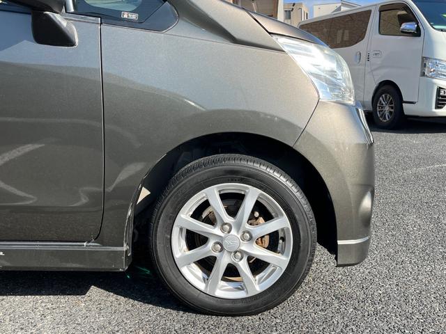 ムーヴ カスタム　Ｘリミテッド　純正メモリーナビ　ワンセグＴＶ　ＣＤ　ＡＭ／ＦＭ　バックカメラ　オートＡＣ　純正１４ＡＷ　ウインカーミラー　ＨＩＤライト　フォグライト　ベンチシート　オートライト　センターメーター　プッシュスタート（13枚目）