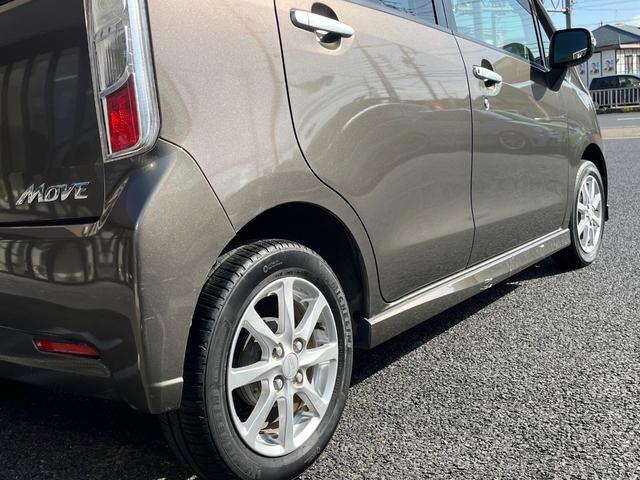 ムーヴ カスタム　Ｘリミテッド　純正メモリーナビ　ワンセグＴＶ　ＣＤ　ＡＭ／ＦＭ　バックカメラ　オートＡＣ　純正１４ＡＷ　ウインカーミラー　ＨＩＤライト　フォグライト　ベンチシート　オートライト　センターメーター　プッシュスタート（22枚目）