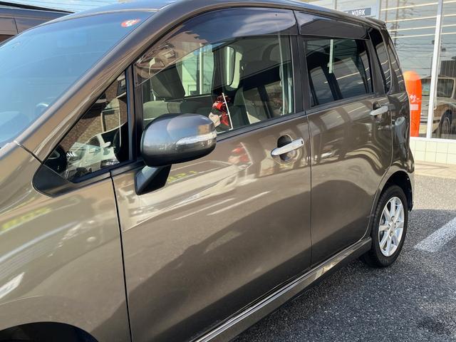 ムーヴ カスタム　Ｘリミテッド　純正メモリーナビ　ワンセグＴＶ　ＣＤ　ＡＭ／ＦＭ　バックカメラ　オートＡＣ　純正１４ＡＷ　ウインカーミラー　ＨＩＤライト　フォグライト　ベンチシート　オートライト　センターメーター　プッシュスタート（34枚目）