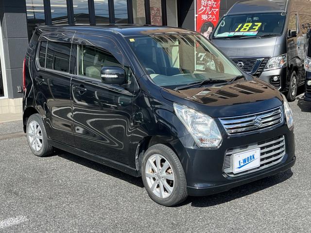 ワゴンR FXリミテッド 純正CDデッキ ラジオAM/FM AUX エンジンプッシュスタート スマートキー 電動格納ミラー アイドリングストップ 純正14AW ライトレベライザー オートエアコン ベンチシート(8枚目)