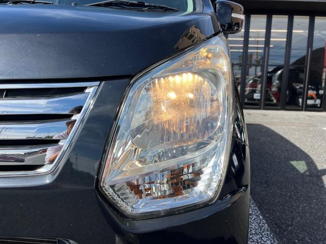 ワゴンR FXリミテッド 純正CDデッキ ラジオAM/FM AUX エンジンプッシュスタート スマートキー 電動格納ミラー アイドリングストップ 純正14AW ライトレベライザー オートエアコン ベンチシート(49枚目)