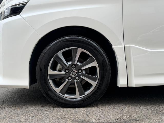 ヴォクシー ZS 煌III メーカー10インチナビ バックカメラ 地デジTV 純正後席12.1インチフリップダウンモニター 黒革ハーフレザーシート 両側パワスラ オートハイビーム リアAC クルーズC スマートキー(11枚目)