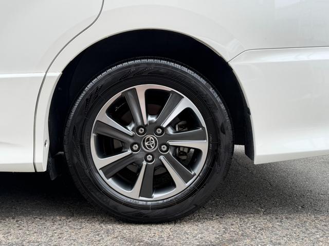 ヴォクシー ZS 煌III メーカー10インチナビ バックカメラ 地デジTV 純正後席12.1インチフリップダウンモニター 黒革ハーフレザーシート 両側パワスラ オートハイビーム リアAC クルーズC スマートキー(12枚目)