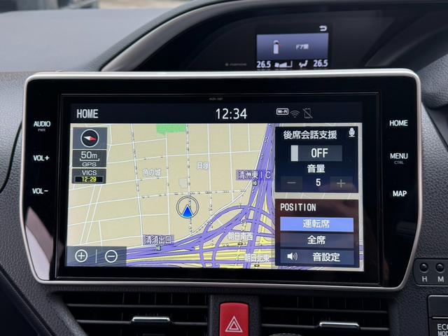 ヴォクシー ZS 煌III メーカー10インチナビ バックカメラ 地デジTV 純正後席12.1インチフリップダウンモニター 黒革ハーフレザーシート 両側パワスラ オートハイビーム リアAC クルーズC スマートキー(24枚目)