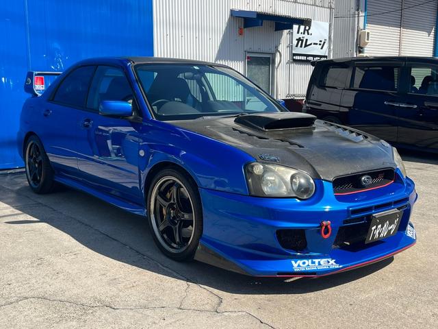 インプレッサ ＷＲＸ　ＳＴｉ　６速マニュアル　社外エキマニ　ＨＫＳキャタライザー　フジツボマフラー　チャージスピードカーボンボンネット　ＶＯＬＴＥＸバンパー　ＨＫＳ車高調　Ｄｅｆｉ追加メーター　ＳＳＲ１８インチアルミ　ブーコン（17枚目）