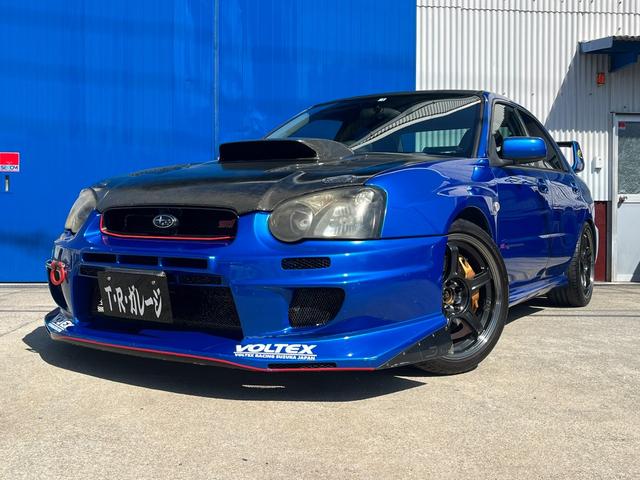 インプレッサ ＷＲＸ　ＳＴｉ　６速マニュアル　社外エキマニ　ＨＫＳキャタライザー　フジツボマフラー　チャージスピードカーボンボンネット　ＶＯＬＴＥＸバンパー　ＨＫＳ車高調　Ｄｅｆｉ追加メーター　ＳＳＲ１８インチアルミ　ブーコン（65枚目）