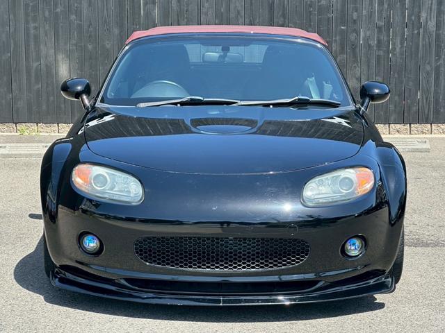 ロードスター ＲＳ　車高調キット　フロントサイドエアロパーツ　ＭＯＭＯステアリング　キーレスエントリー　社外マフラー　ＨＩＤヘッドライト　赤色ソフトトップ　ＥＴＣ　６速ＭＴ車両　純正１８インチアルミホイール　フォグライト（43枚目）