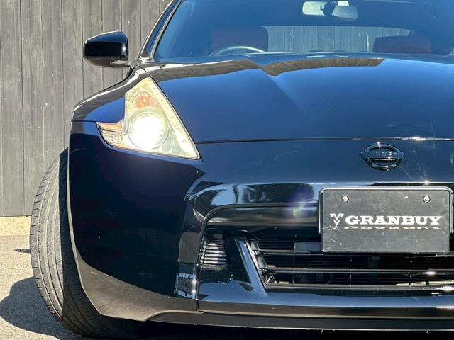 フェアレディＺ バージョンＴ　全塗装ブラック　部分ゴールド塗装　本革ブラウンシート　シートヒーター　ＢＯＳＥサウンド　電動シート　ＣＤ・ＤＶＤ再生　スマートキー　純正１８インチアルミホイール　パドルシフト　ＥＴＣ　３連メーター（34枚目）