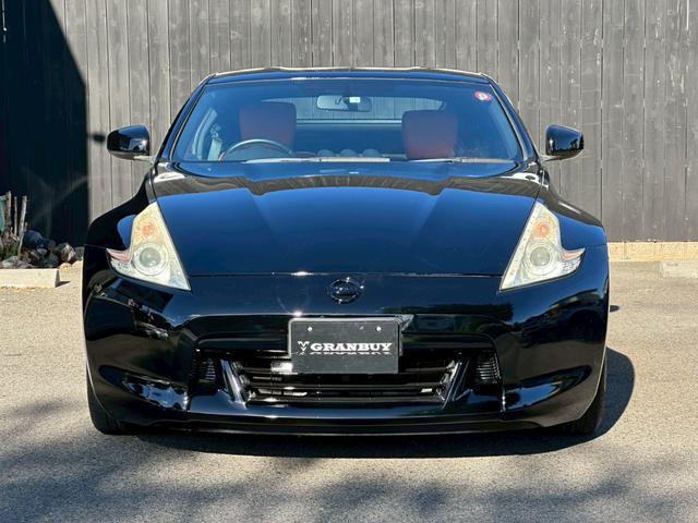 フェアレディＺ バージョンＴ　全塗装ブラック　部分ゴールド塗装　本革ブラウンシート　シートヒーター　ＢＯＳＥサウンド　電動シート　ＣＤ・ＤＶＤ再生　スマートキー　純正１８インチアルミホイール　パドルシフト　ＥＴＣ　３連メーター（35枚目）