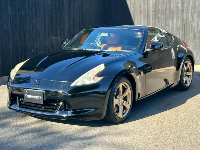 フェアレディＺ バージョンＴ　全塗装ブラック　部分ゴールド塗装　本革ブラウンシート　シートヒーター　ＢＯＳＥサウンド　電動シート　ＣＤ・ＤＶＤ再生　スマートキー　純正１８インチアルミホイール　パドルシフト　ＥＴＣ　３連メーター（36枚目）