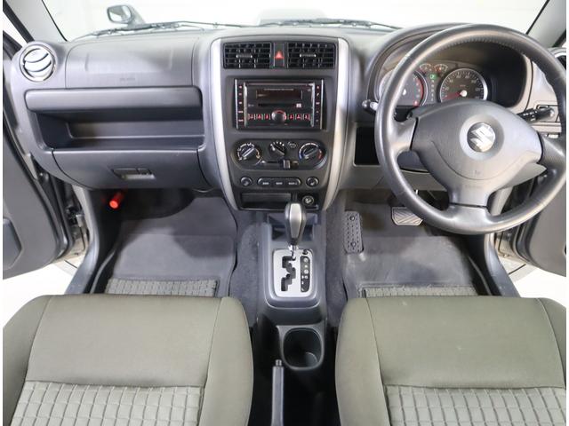 ジムニー ワイルドウインド６型　目玉車　ＣＤプレーヤー・ＥＴＣ・マット　２ＤＩＮ　ＣＤプレーヤー（ラジオ・ＭＤ）　ＥＴＣ　トレータイプフロアマット　ドアバイザー　シートヒーター　キーレスエントリー　フロントフォグランプ　ルーフレール　スペアタイヤカバー　パートタイム４ＷＤ（9枚目）