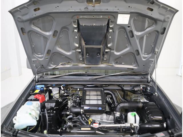ジムニー ワイルドウインド６型　目玉車　ＣＤプレーヤー・ＥＴＣ・マット　２ＤＩＮ　ＣＤプレーヤー（ラジオ・ＭＤ）　ＥＴＣ　トレータイプフロアマット　ドアバイザー　シートヒーター　キーレスエントリー　フロントフォグランプ　ルーフレール　スペアタイヤカバー　パートタイム４ＷＤ（20枚目）