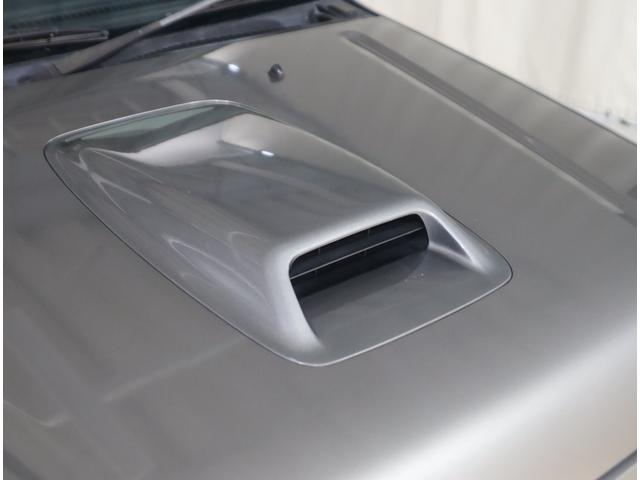 ジムニー ワイルドウインド６型　目玉車　ＣＤプレーヤー・ＥＴＣ・マット　２ＤＩＮ　ＣＤプレーヤー（ラジオ・ＭＤ）　ＥＴＣ　トレータイプフロアマット　ドアバイザー　シートヒーター　キーレスエントリー　フロントフォグランプ　ルーフレール　スペアタイヤカバー　パートタイム４ＷＤ（33枚目）