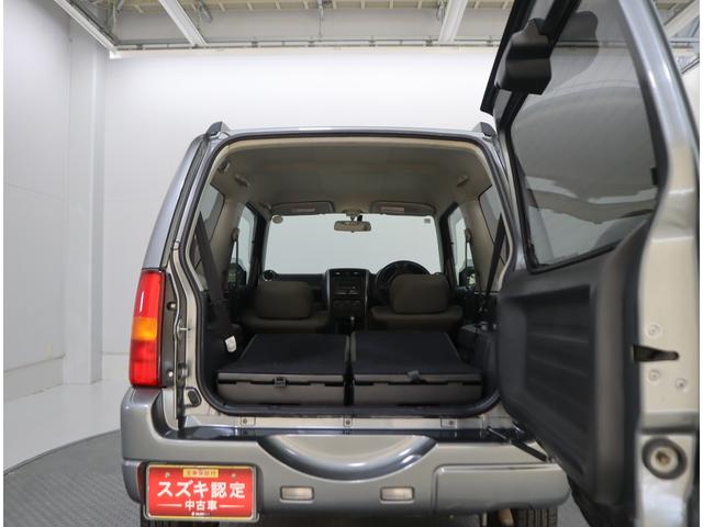 ジムニー ワイルドウインド６型　目玉車　ＣＤプレーヤー・ＥＴＣ・マット　２ＤＩＮ　ＣＤプレーヤー（ラジオ・ＭＤ）　ＥＴＣ　トレータイプフロアマット　ドアバイザー　シートヒーター　キーレスエントリー　フロントフォグランプ　ルーフレール　スペアタイヤカバー　パートタイム４ＷＤ（49枚目）