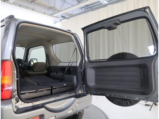 ジムニー ワイルドウインド６型　目玉車　ＣＤプレーヤー・ＥＴＣ・マット　２ＤＩＮ　ＣＤプレーヤー（ラジオ・ＭＤ）　ＥＴＣ　トレータイプフロアマット　ドアバイザー　シートヒーター　キーレスエントリー　フロントフォグランプ　ルーフレール　スペアタイヤカバー　パートタイム４ＷＤ（50枚目）