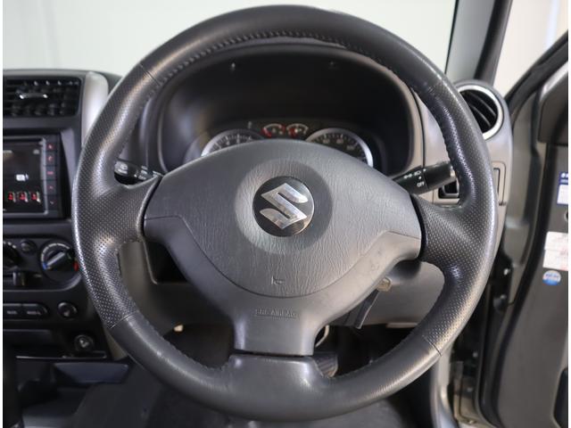 ジムニー ワイルドウインド６型　目玉車　ＣＤプレーヤー・ＥＴＣ・マット　２ＤＩＮ　ＣＤプレーヤー（ラジオ・ＭＤ）　ＥＴＣ　トレータイプフロアマット　ドアバイザー　シートヒーター　キーレスエントリー　フロントフォグランプ　ルーフレール　スペアタイヤカバー　パートタイム４ＷＤ（77枚目）