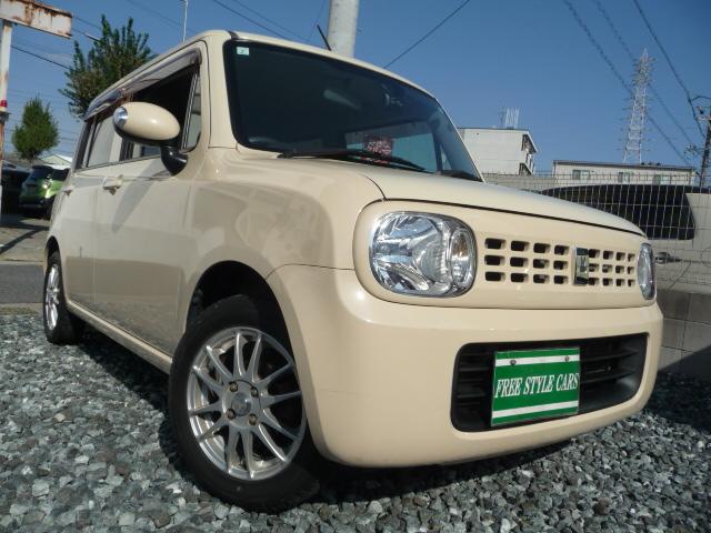 アルトラパン X 禁煙車メモリーナビ地デジテレビDVDビデオ再生CD車検2年グー鑑定済みETCウインカー付きミラー14inAWドラレコ前カラー連動BカメラTチェーンWエアーBスマキーABSプッシュスタートBステアチルト(3枚目)