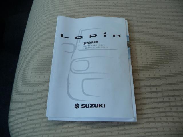 アルトラパン X 禁煙車メモリーナビ地デジテレビDVDビデオ再生CD車検2年グー鑑定済みETCウインカー付きミラー14inAWドラレコ前カラー連動BカメラTチェーンWエアーBスマキーABSプッシュスタートBステアチルト(31枚目)