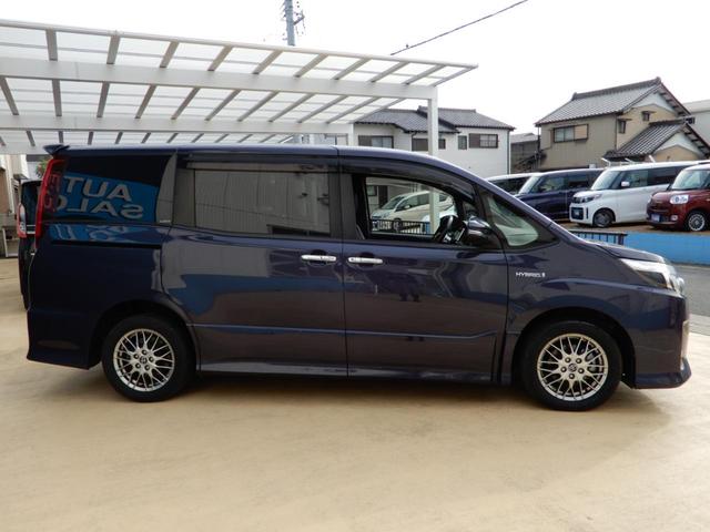 ノア ハイブリッドSi ダブルバイビー 後席フリップモニター 9インチナビ フルセグ ブルートゥース 両側パワースライド セーフティーセンス ETC ハーフレザー バックガイドモニター 純正アルミホイール プッシュスタート スマートキー(14枚目)