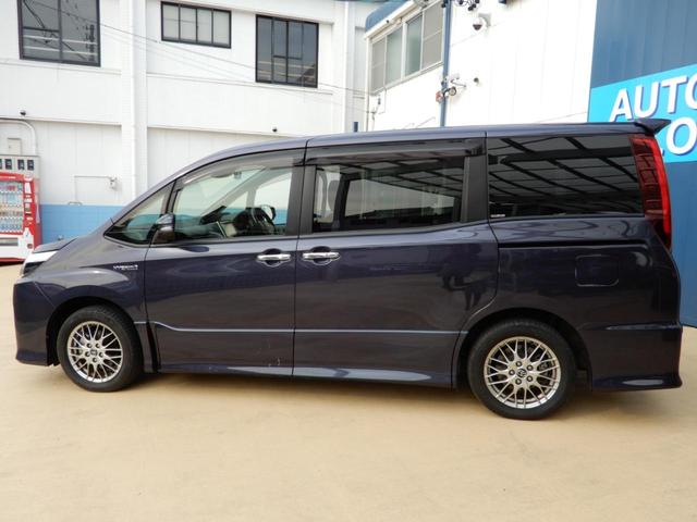 ノア ハイブリッドSi ダブルバイビー 後席フリップモニター 9インチナビ フルセグ ブルートゥース 両側パワースライド セーフティーセンス ETC ハーフレザー バックガイドモニター 純正アルミホイール プッシュスタート スマートキー(18枚目)