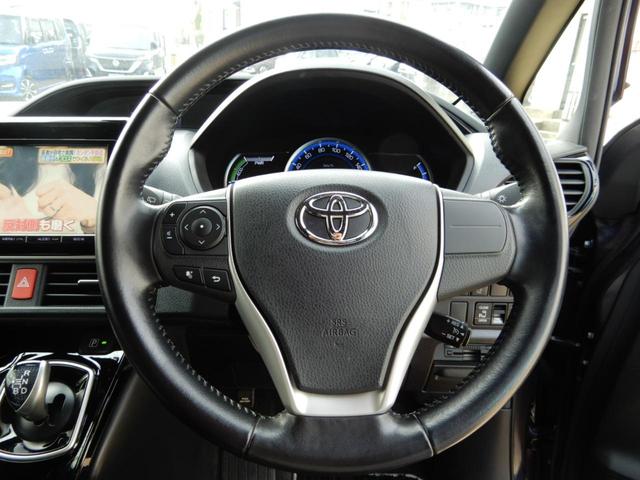 ノア ハイブリッドSi ダブルバイビー 後席フリップモニター 9インチナビ フルセグ ブルートゥース 両側パワースライド セーフティーセンス ETC ハーフレザー バックガイドモニター 純正アルミホイール プッシュスタート スマートキー(20枚目)