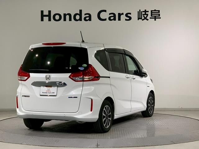 フリードハイブリッド ハイブリッド・Ｇホンダセンシング　両側電動スライドドア　シートヒーター　メモリナビ　軽減ブレーキ　キーフリーシステム　ＤＶＤ再生可能　サイドカーテンエアバック　ＥＣＯＮ　後カメラ　Ａクルーズ　地デジフルセグＴＶ　ＬＥＤヘッドランプ（2枚目）
