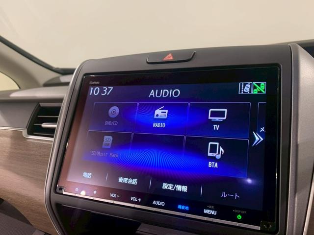 フリードハイブリッド ハイブリッド・Ｇホンダセンシング　両側電動スライドドア　シートヒーター　メモリナビ　軽減ブレーキ　キーフリーシステム　ＤＶＤ再生可能　サイドカーテンエアバック　ＥＣＯＮ　後カメラ　Ａクルーズ　地デジフルセグＴＶ　ＬＥＤヘッドランプ（6枚目）