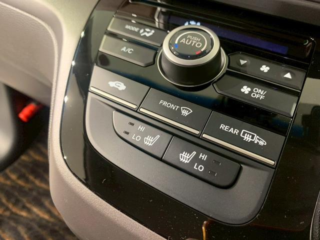 フリードハイブリッド ハイブリッド・Ｇホンダセンシング　両側電動スライドドア　シートヒーター　メモリナビ　軽減ブレーキ　キーフリーシステム　ＤＶＤ再生可能　サイドカーテンエアバック　ＥＣＯＮ　後カメラ　Ａクルーズ　地デジフルセグＴＶ　ＬＥＤヘッドランプ（9枚目）