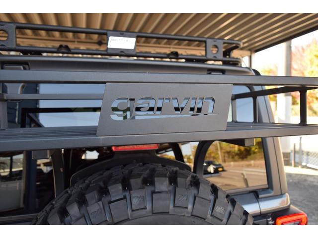 ジープ・ラングラーアンリミテッド ルビコン　リーコン　１００台限定車　べストップサンライダー（ハードＴＯＰあり）　ジェプセン１インチリフトアップ　４本出しマフラー　スミティビルトルーフラック　ＧＡＲＶＩＮトレイルラック　ファブテックカーゴラック（12枚目）