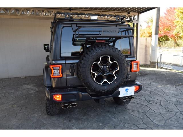ジープ・ラングラーアンリミテッド ルビコン　リーコン　１００台限定車　べストップサンライダー（ハードＴＯＰあり）　ジェプセン１インチリフトアップ　４本出しマフラー　スミティビルトルーフラック　ＧＡＲＶＩＮトレイルラック　ファブテックカーゴラック（42枚目）