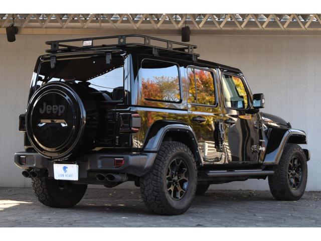 ジープ・ラングラーアンリミテッド サハラ　ブラックレザー　ジェプセン４本出しマフラー　スミティルーフラック　べストップサンライダー（ハードＴＯＰあり）　ルビコンホイール　ジオランダＸＡＴタイヤ　エルフォードフロントバンパー　ドラレコ（9枚目）