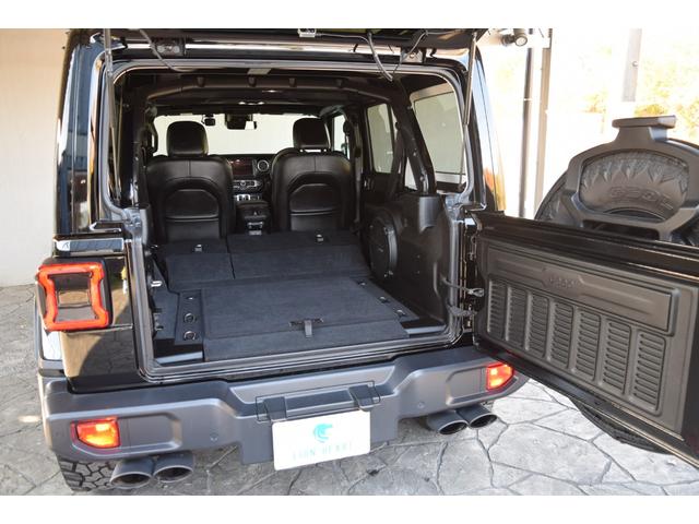 ジープ・ラングラーアンリミテッド サハラ　ブラックレザー　ジェプセン４本出しマフラー　スミティルーフラック　べストップサンライダー（ハードＴＯＰあり）　ルビコンホイール　ジオランダＸＡＴタイヤ　エルフォードフロントバンパー　ドラレコ（23枚目）